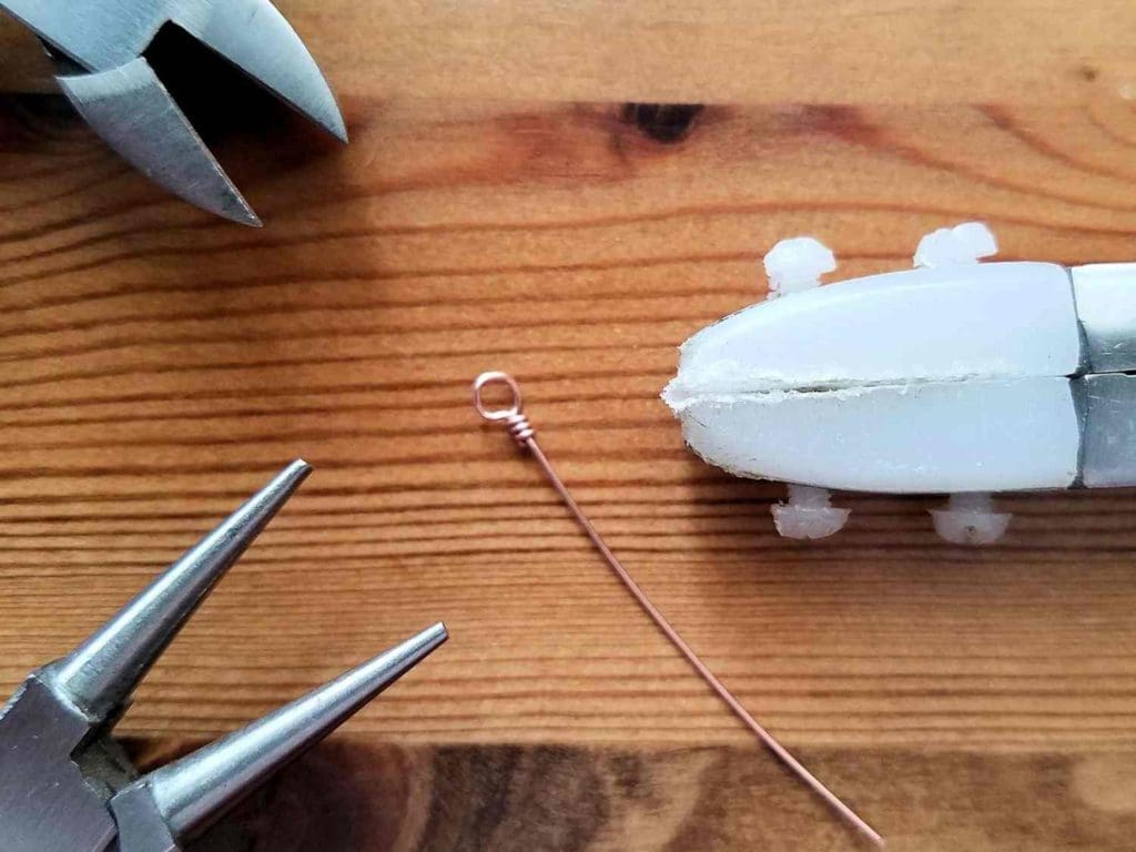 Step 3 - Make a complete wrapped loop on one end of your first piece of 24ga wire, as shown.