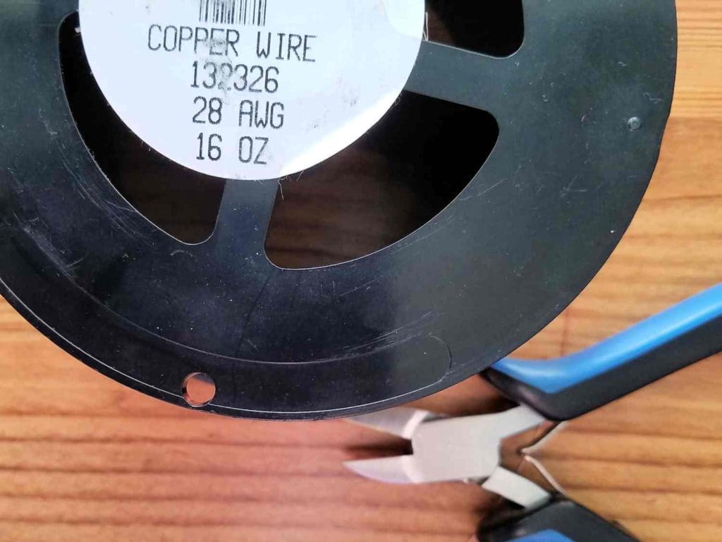 Step 1 - Measure and cut a 40-inch length of 28ga dead soft wire. I used dead soft copper wire, as shown here and specified in the materials list.