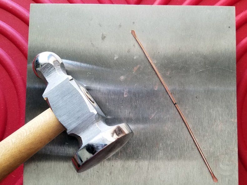 Core Wires Step 6 - Use your chasing hammer and bench block to paddle the ends of all three 18ga wires, as shown.