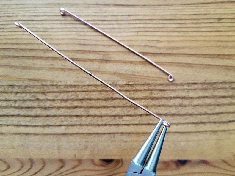 Core Wires Step 9 - Begin forming the remaining two 18ga core wires using the tips of your round nose pliers, as shown.