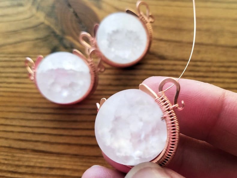 Weaving Step 6 - When the weave is complete, secure the weaving wire with three wraps around the outer core wire, as shown. Then break your weaving wire.