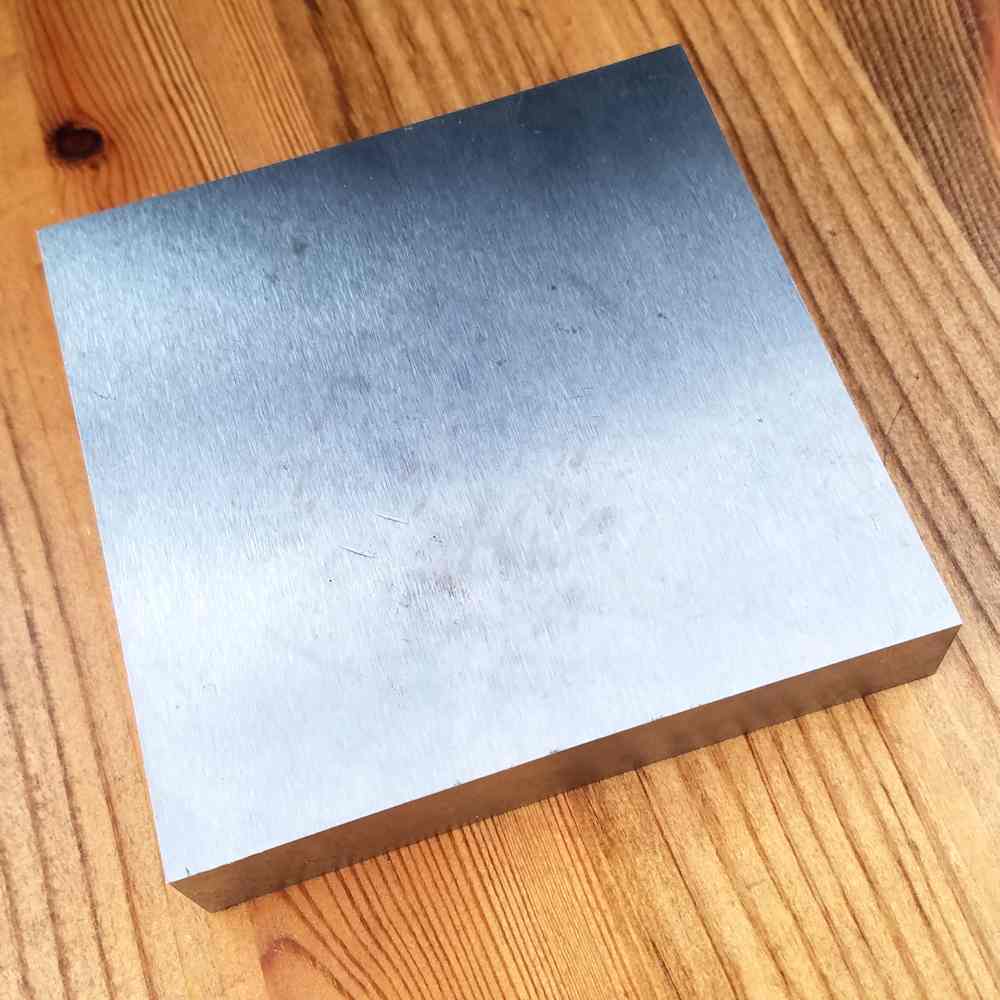 This is a standard 4-inch hardened steel bench block. Although this one doesn't have the sound deadening benefit of a rubber base, it does have a large work surface, which is very useful for wire work. 