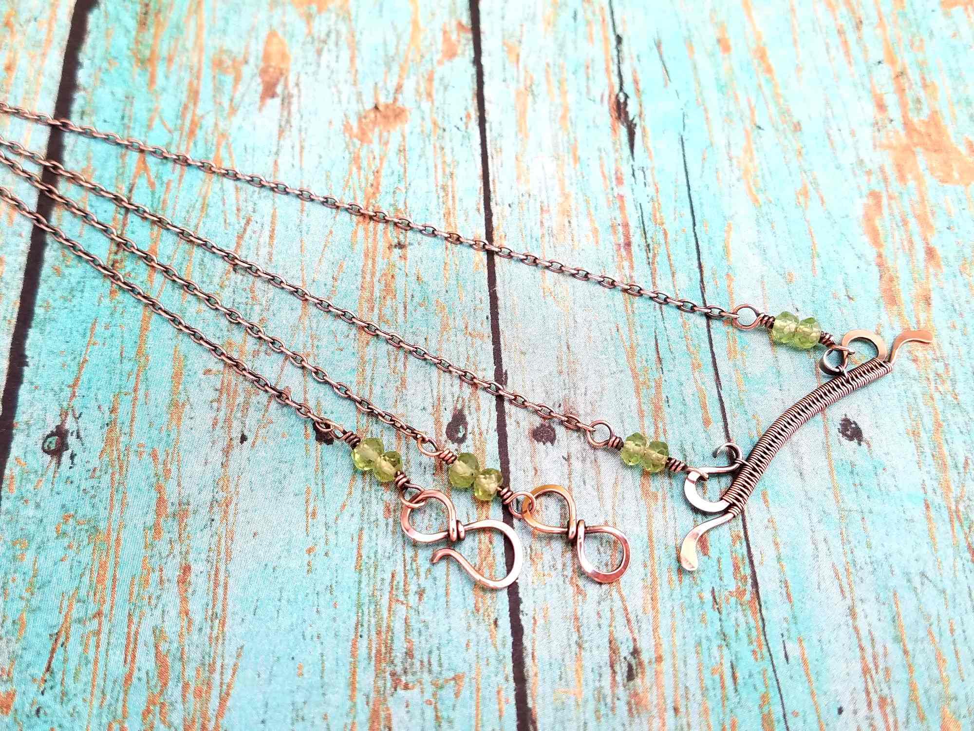 The Delicate Bar Pendant is a quick and easy wire weaving tutorial suitable for beginners. This pretty little bar pendant is very versatile as it can be used as a component in more complex pieces or it can stand on its own. It also makes a great birthstone necklace when accented with crystal or gemstone beads. The necklace pictured here is accented with genuine Peridot beads, wich work beautifully with the copper wire use to make the pendant.