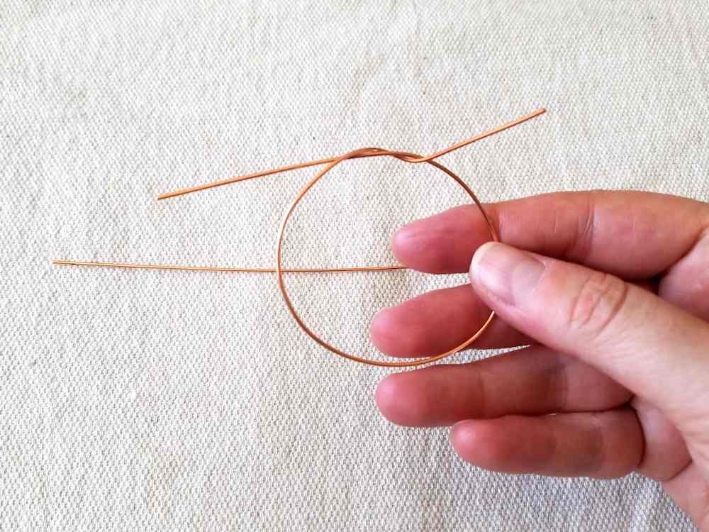 Step 3 - Tie an overhand knot in your first 18ga core wire