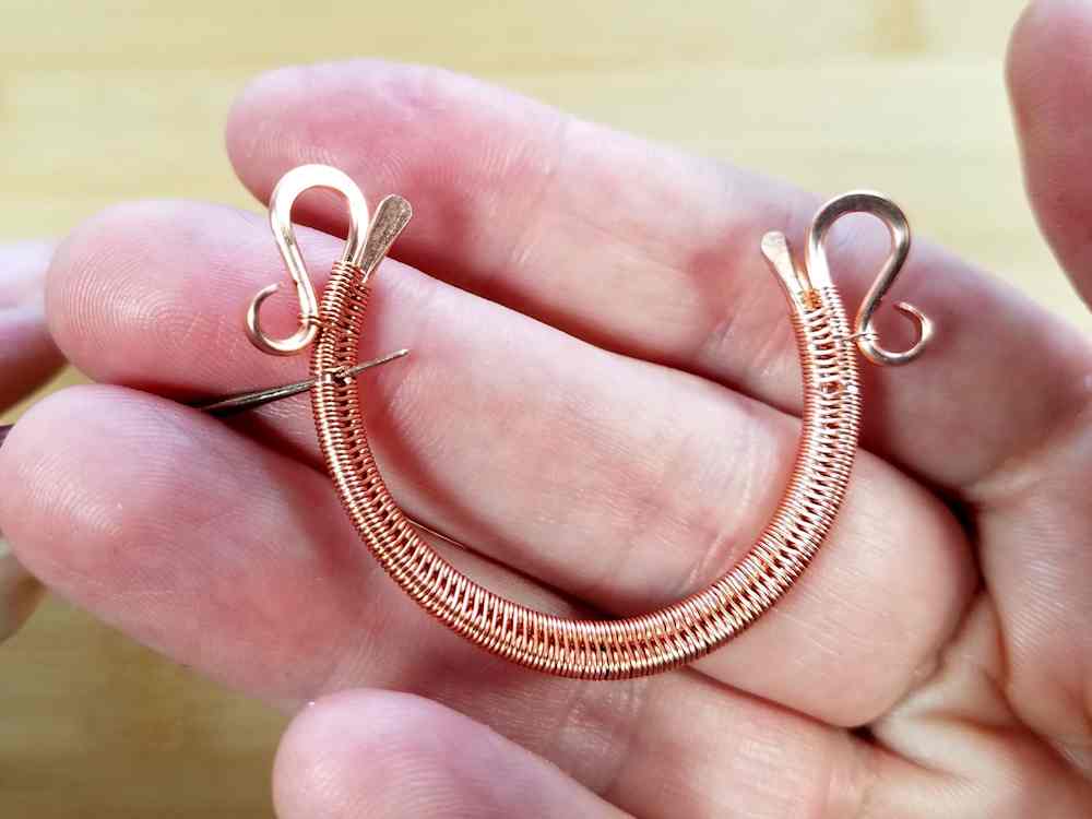 Step 5 - Use a sharp beading awl to pierce the weave between Wires 1 and 2 at the points you marked in the previous step.