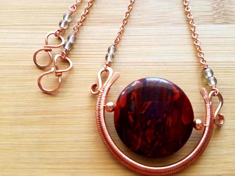 Your Egyptian Sun Necklace is now complete. It will look something like the piece shown here. Make any final adjustments before antiquing and polishing your necklace.