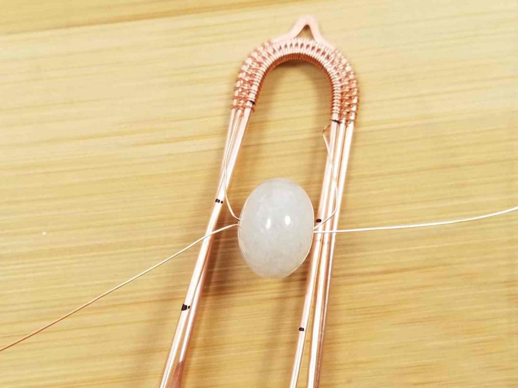 Step 6 - suspend Bead 1 within the frame with your weaving wires