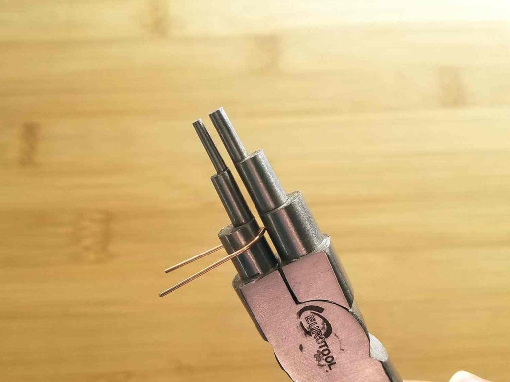 Step 3 - Form Wire 2 into an elongated U shape using the 8mm step on your bail-making pliers, as shown.