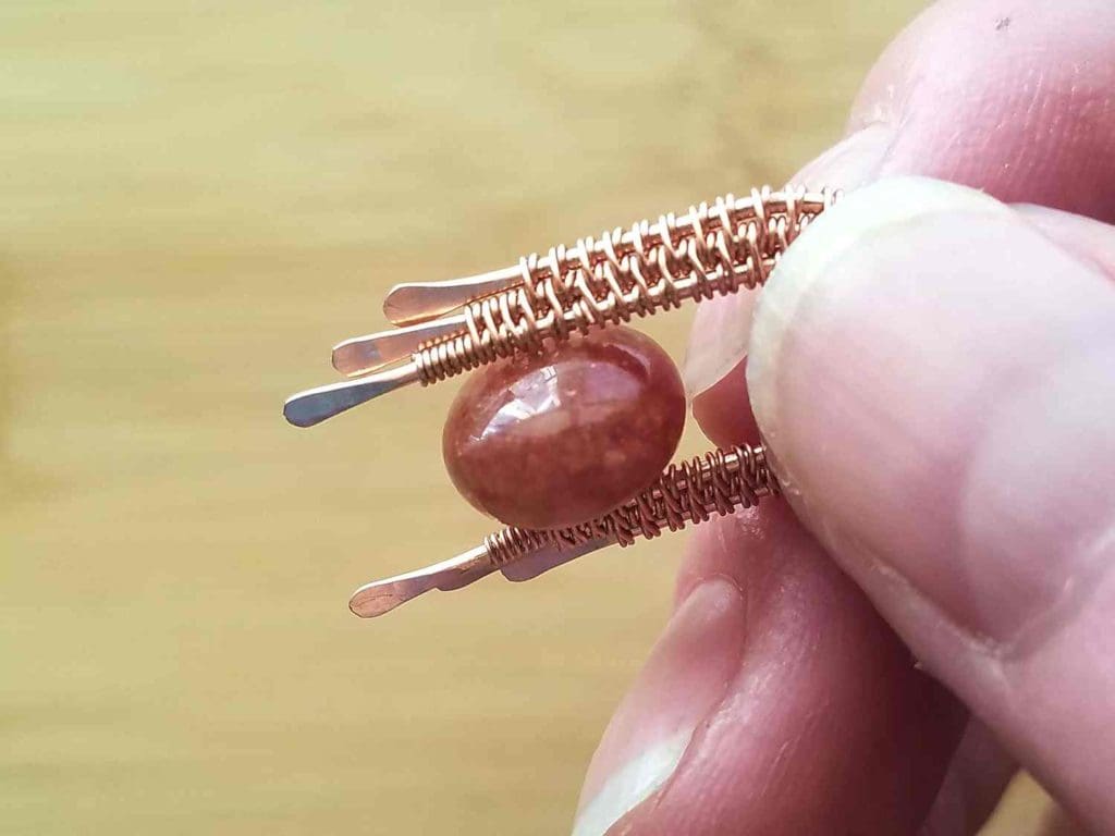 Step 10 - Coil the weaving wire around Wire 1 and break your weaving wire, as shown.