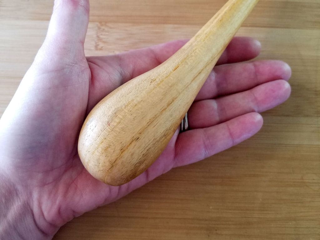 Peening Grip: The deeper curve on the bulb of the handle should face your thumb, as shown.