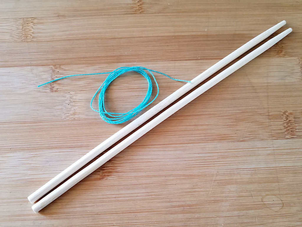 For the purpose of demonstrating the Figure 8 weave, I'm using wood chopsticks and waxed jewelry cord in a contrasting color. Those are the materials shown here. 