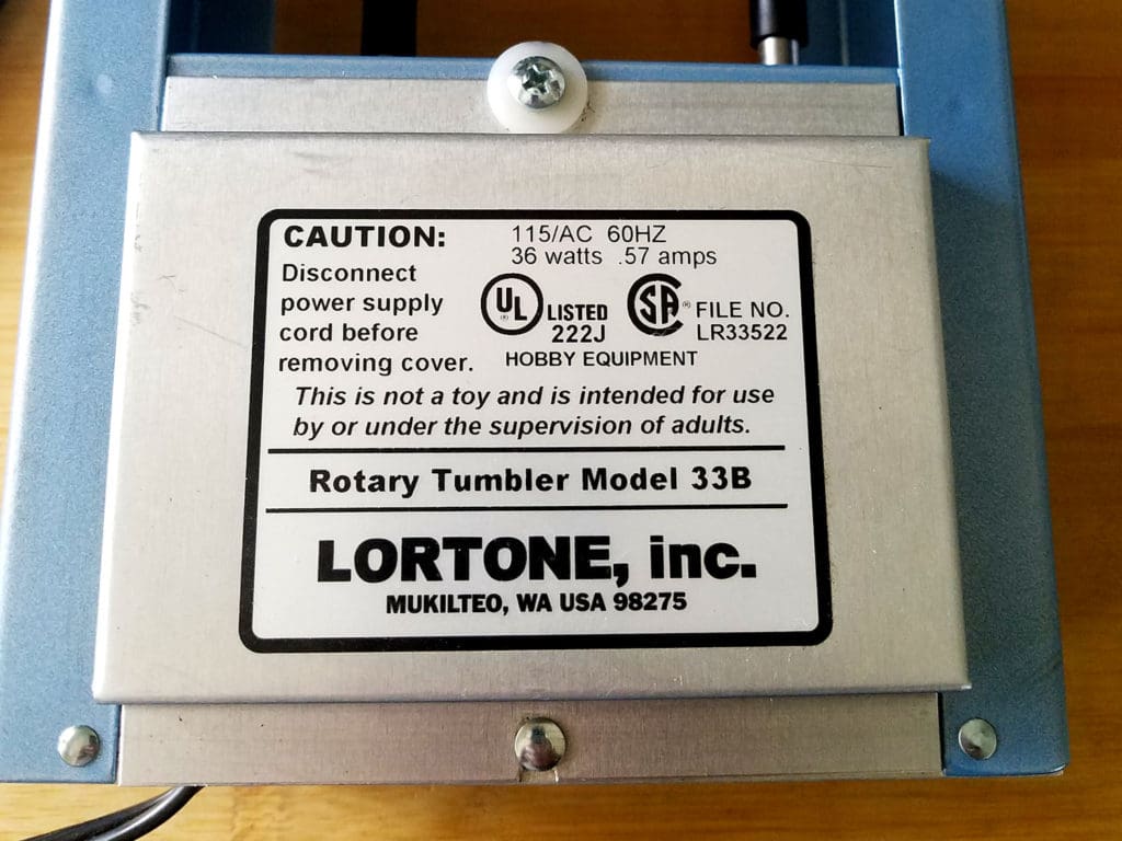 I use and recommend the Loretone Model 33B dual barrel rotary tumbler. Here's a closeup of the manufacturer's specifications tag.