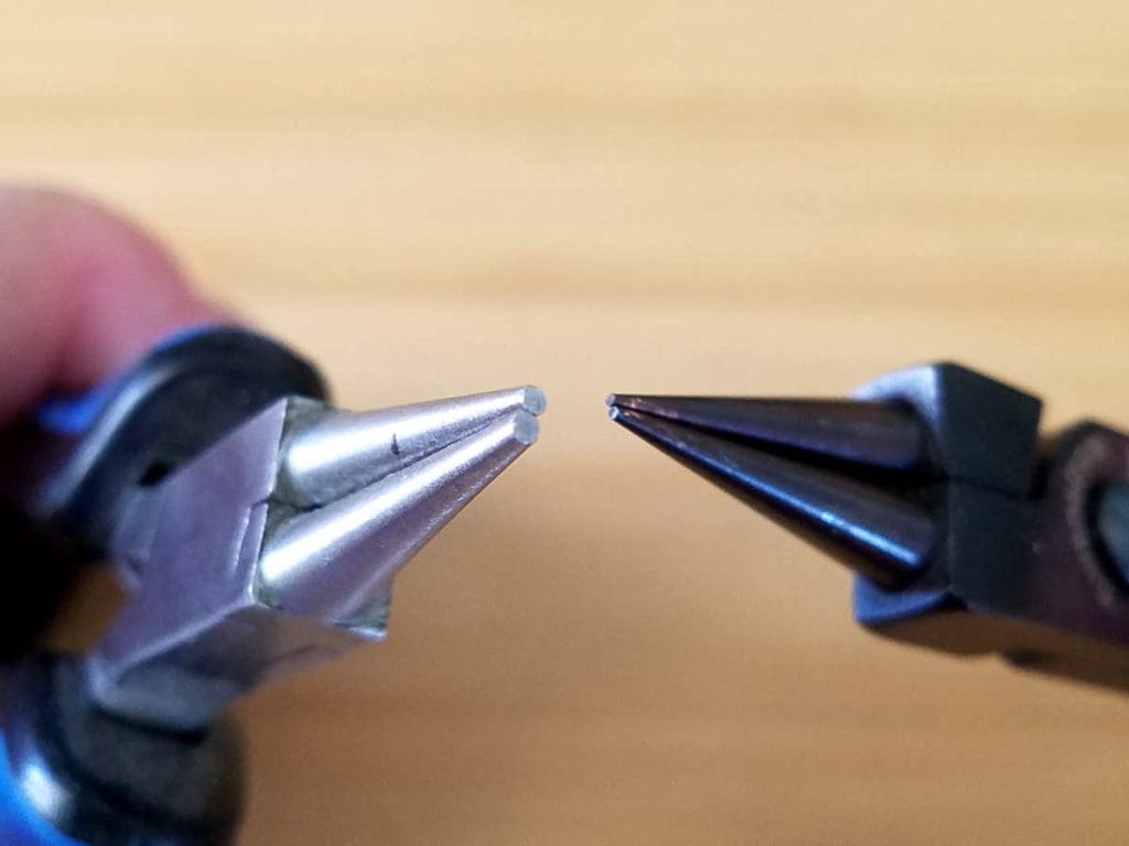 This image shows a side-by-side comparison of my generic round nose pliers and my precision professional-grade pliers. The difference is in the precision of the jaws. And that does effect outcomes when it comes to making jewelry. It's easier to avoid tool marks on wire with the higher-end tools. 
