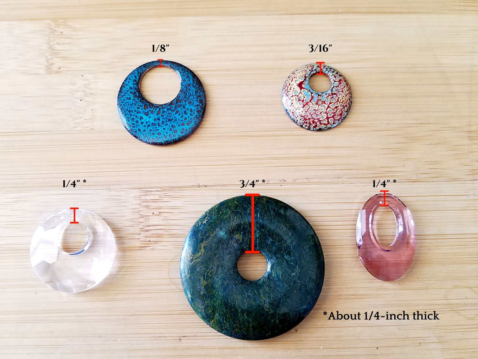 This image shows five different styles and sizes of pendants that work well with the interchangeable Figure 8 weave bail design. 