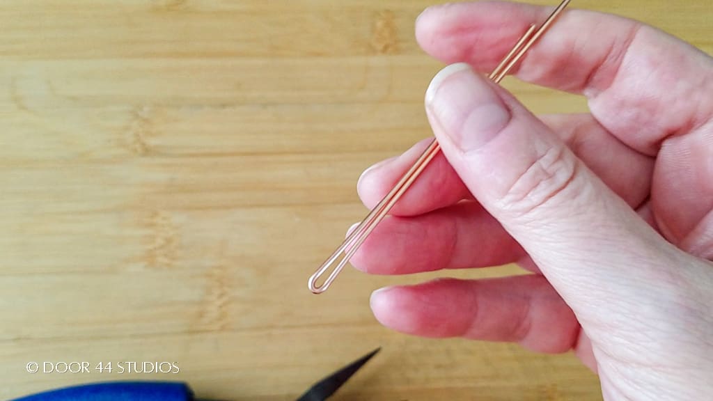 Folded wire, ready to begin shaping the heart frame