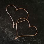 Simple heart hoop earrings made with a single piece of 20g copper wire